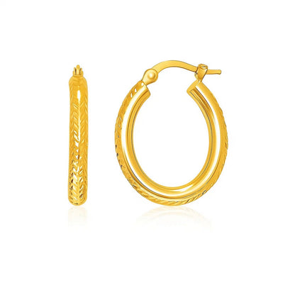 14k Yellow Gold Diamond Cut Textured Oval Hoop Earrings.