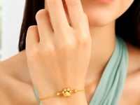 14k Yellow Gold Adjustable Paw Print Bracelet (1.10 mm)